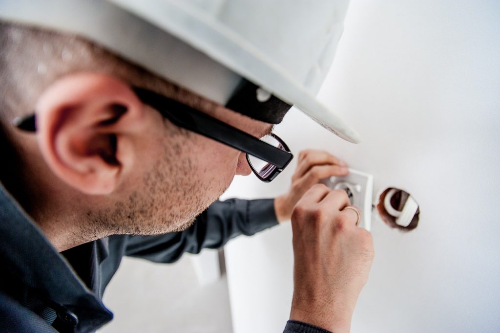 electrician fixing electrics