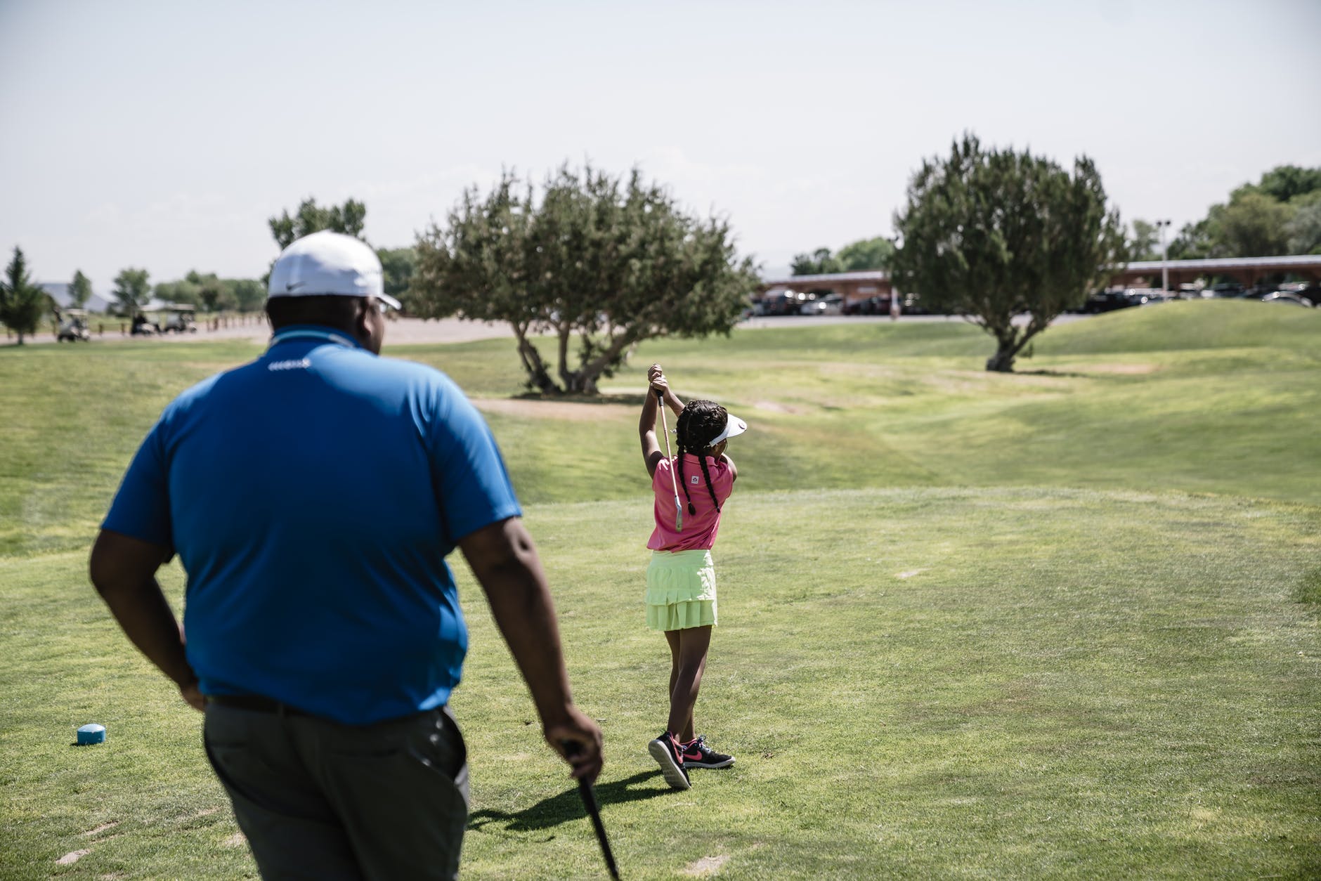 Kids playing golf