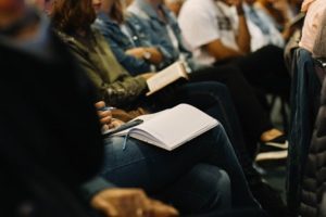 Group of people during book reading